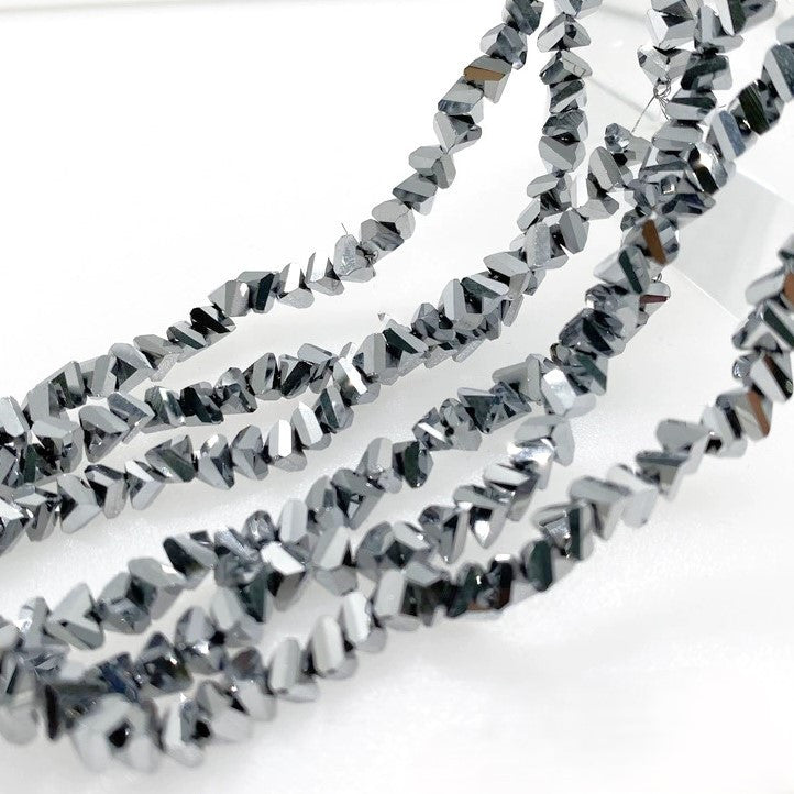 Намистини Swarovski ограновування трикутник 6 мм 30 см (+-85 шт.) Сріблястий металік