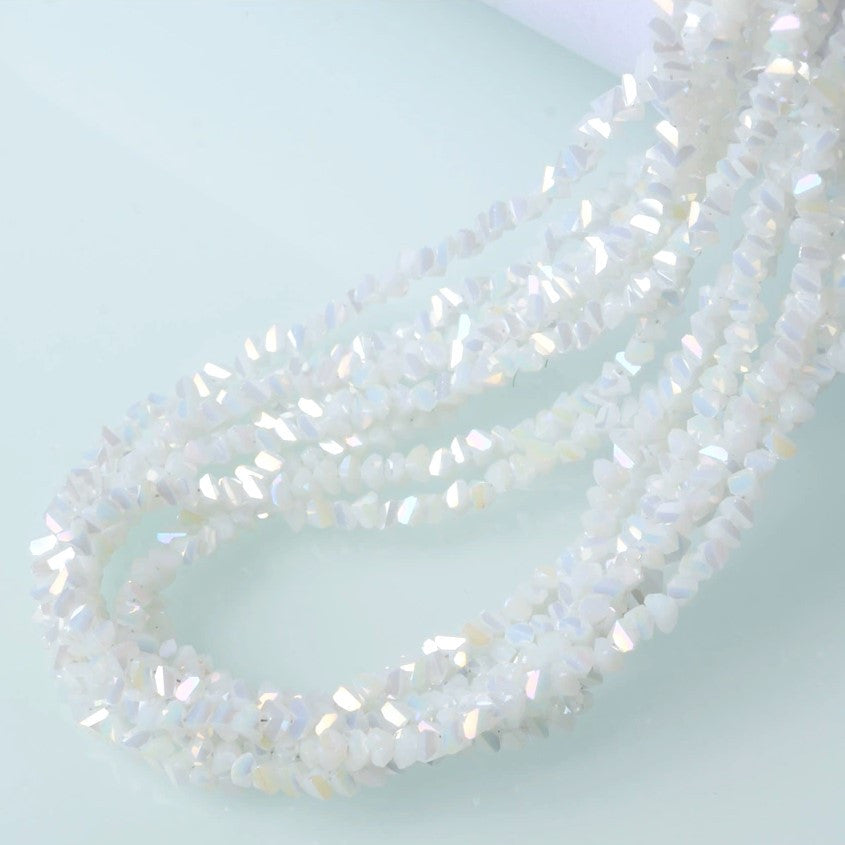 Намистини Swarovski ограновування трикутник 4 мм 35 см (+-130 шт.) Білий АВ