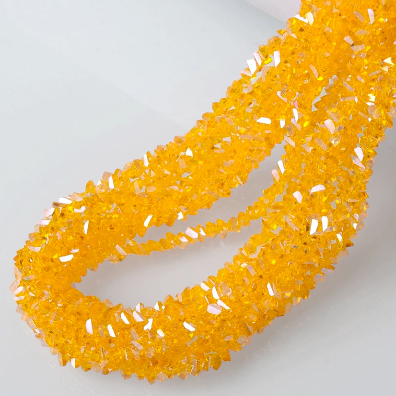 Намистини Swarovski ограновування трикутник 6 мм 30 см (+-85 шт.) Бурштиновий АВ прозорий