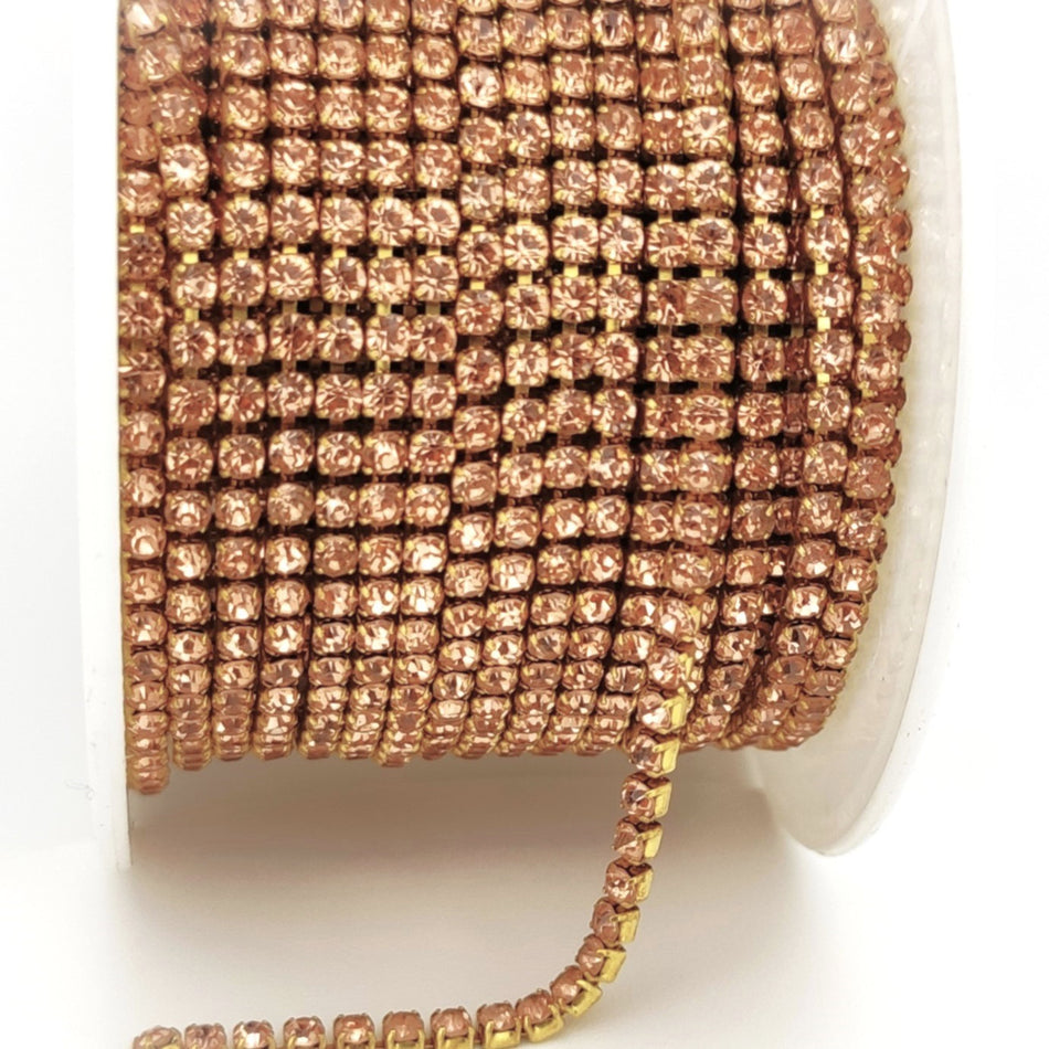 Стразовий ланцюг ss8 (2,5 мм) 1 м LCT Сhampagne Rose gold